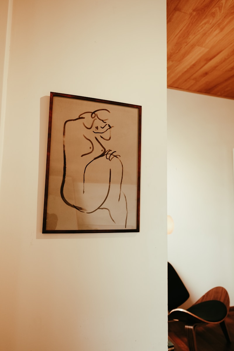 A picture hanging on the wall of a living room